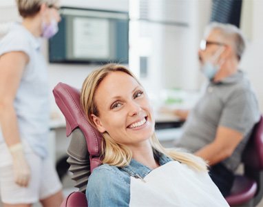 Woman smiling at dentist in Wauwatosa