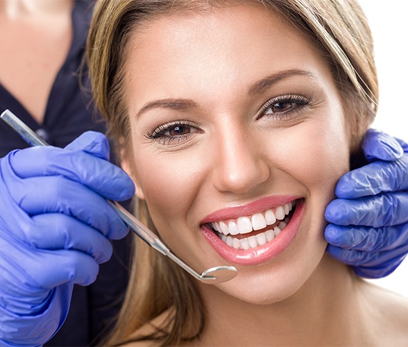 Patient receiving preventive dentistry checkup
